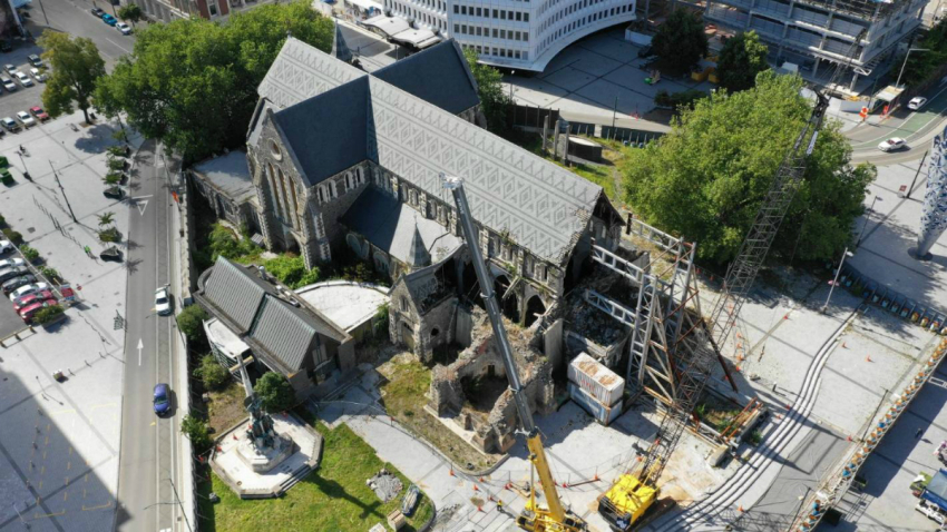 Workers carry out initial stabilization work at Christ Church Cathedral.