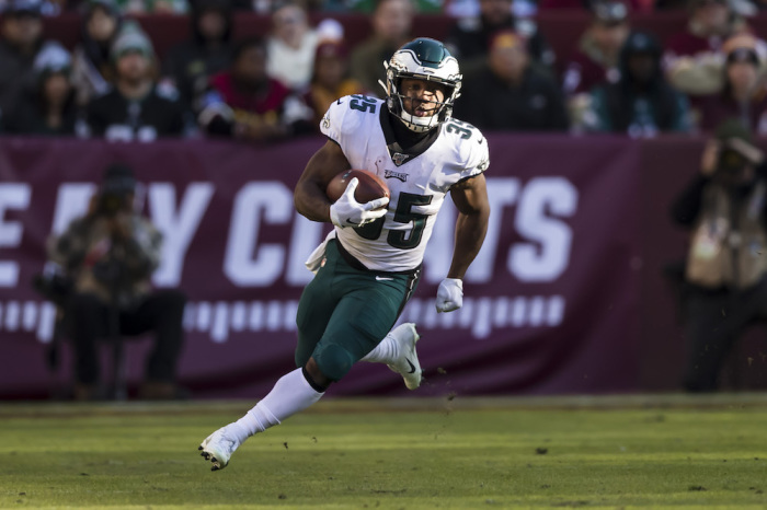  Boston Scott #35 of the Philadelphia Eagles carries the ball against the Washington Redskins during the first half at FedExField on December 15, 2019, in Landover, Maryland.