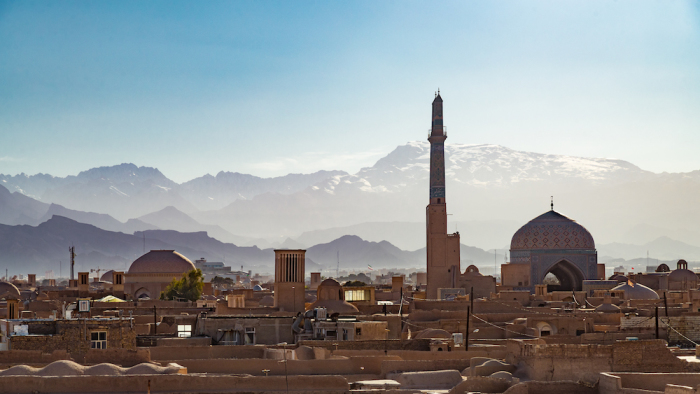 Jameh Mosque and Snowcapped Mountains in Yazd, Iran