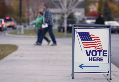 A couple walks into a polling center to vote in the midterm elections on November 6, 2018, in Provo, Utah. 