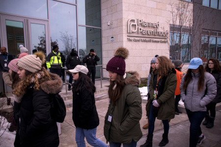 Demonstrators gather during a protest vigil sponsored by The Christian Defense Coalition and Priests for Life outside of the Planned Parenthood of Metropolitan Washington, D.C., Carol Whitehill Moses Center on January 17, 2019, in Washington, D.C.