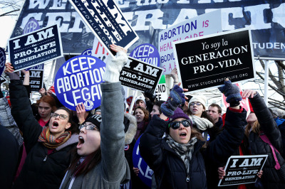 Pro-life activists try to block pro-choice activists as the annual March for Life passes by in front of the U.S. Supreme Court January 22, 2015, in Washington, D.C. Pro-life activists gathered in the nation’s capital to mark the 1973 Supreme Court Roe v. Wade decision that legalized abortion. 