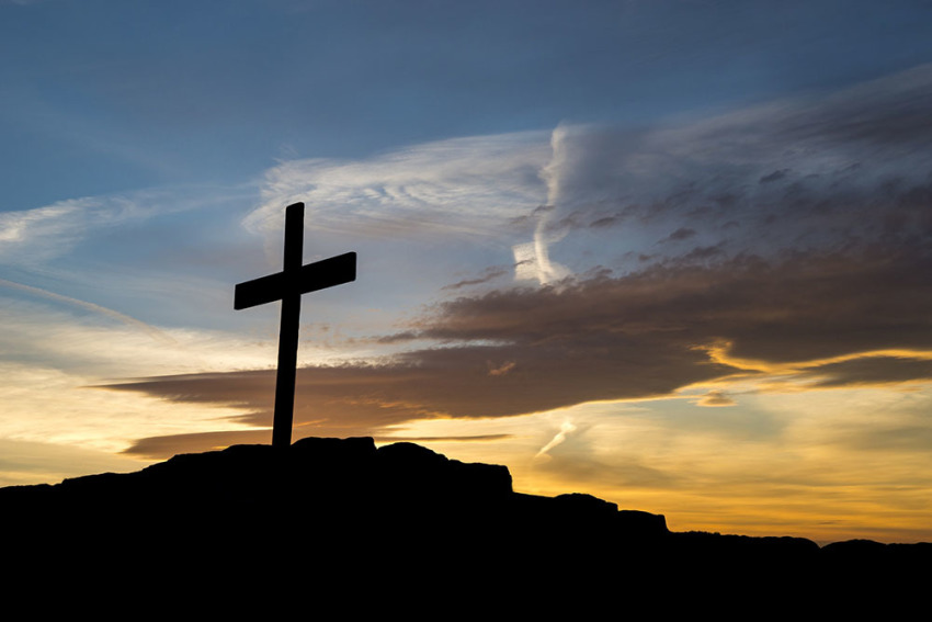 A temporary wooden cross stands on Eccles Pike in England.