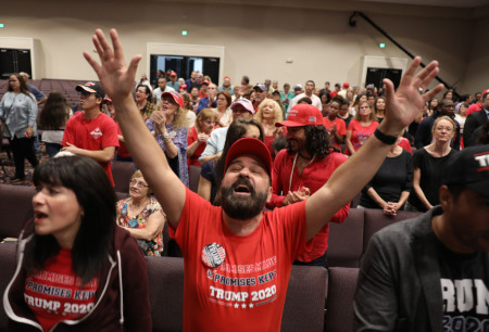 Joel Perez prays during the 'Evangelicals for Trump' campaign event held at the King Jesus International Ministry as they await the arrival of President Donald Trump on January 03, 2020, in Miami, Florida.