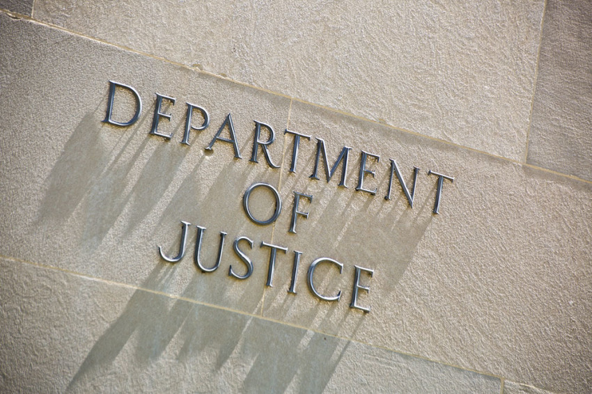 The entrance signage for the United States Department of Justice Building in Washington D.C. The Department of Justice, the U.S. law enforcement and administration of Justice government agency.