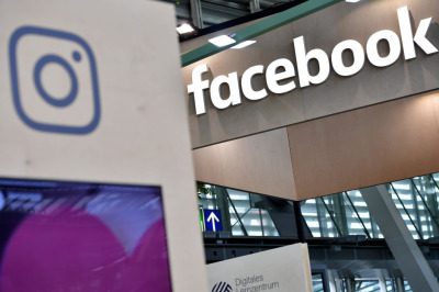 The Instagram and Facebook logos are displayed at the 2018 CeBIT technology trade fair on June 12, 2018, in Hanover, Germany. 