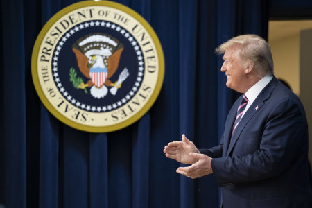 President Donald J. Trump applauds the crowd as he is introduced on stage at the Summit on Transforming Mental Health Treatment on Thursday, Dec. 19, 2019, at the Eisenhower Executive Office Building South Court Auditorium at the White House.