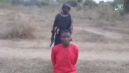 A child militant affiliated with the Islamic State's West Africa Province kills Ropvil Daciya Dalep in a video released by the Islamic State's media arm in January 2020.