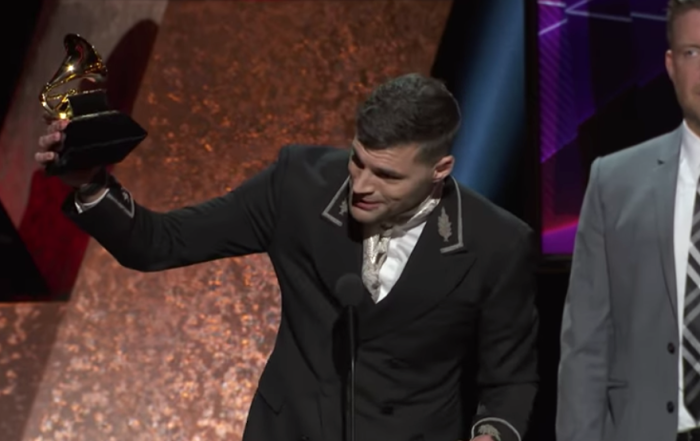 Joel Smallbone of For King & Country accepts a Grammy at the 2020 awards show, Jan. 27, 2020.