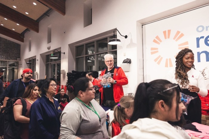 Los Angeles Angels Manager Joe Maddon and volunteers with his Respect 90 Foundation hold a 'Thanksmas' event at the Orange County Rescue Mission's Village of Hope in Tustin, California, on Jan. 28, 2020.