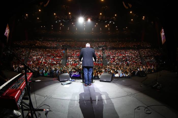 Franklin Graham preaches at an evangelistic event in 2019.