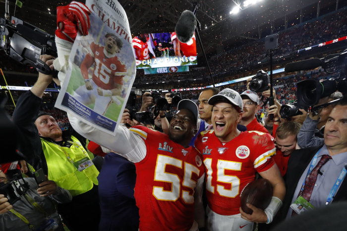 Frank Clark #55 of the Kansas City Chiefs and Patrick Mahomes #15 of the Kansas City Chiefs celebrate after defeating San Francisco 49ers by 31-20 in Super Bowl LIV at Hard Rock Stadium on Feb. 2, 2020, in Miami, Florida.