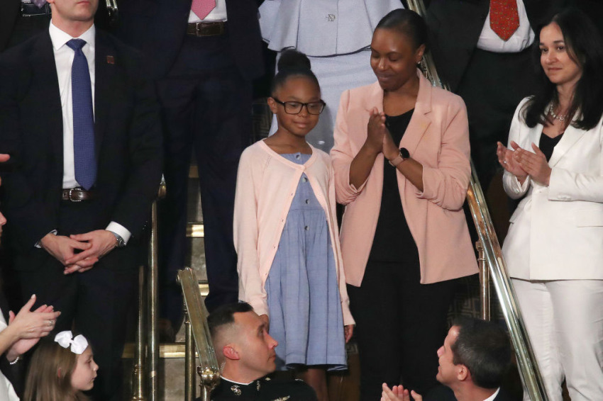 Stephanie Davis and her daughter Janiyah, attend the State of the Union address in the chamber of the U.S. House of Representatives on February 04, 2020, in Washington, D.C.