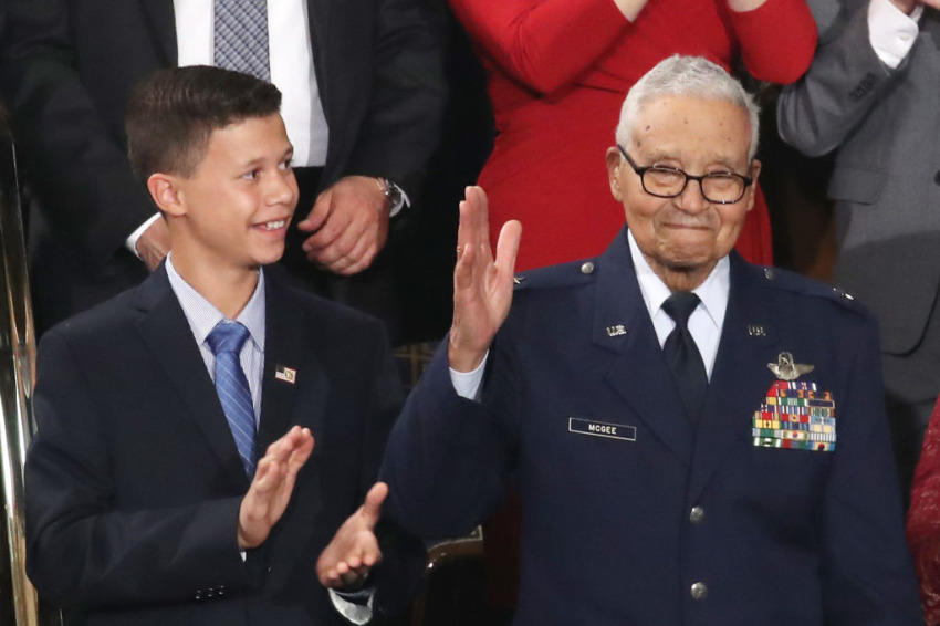 Retired U.S. Air Force Col. Charles McGee, who served with the Tuskegee Airmen, attends the State of the Union address with his great-grandson Iain Lanphier in the chamber of the U.S. House of Representatives on February 04, 2020, in Washington, D.C.