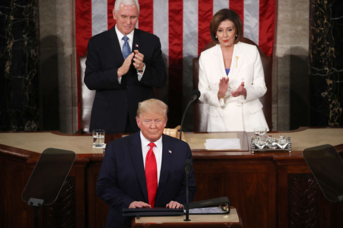 House Speaker Rep. Nancy Pelosi, D-Calif., and Vice President Mike Pence applaud as President Donald Trump steps to the lectern for the State of the Union address in the chamber of the U.S. House of Representatives on February 04, 2020 in Washington, D.C.