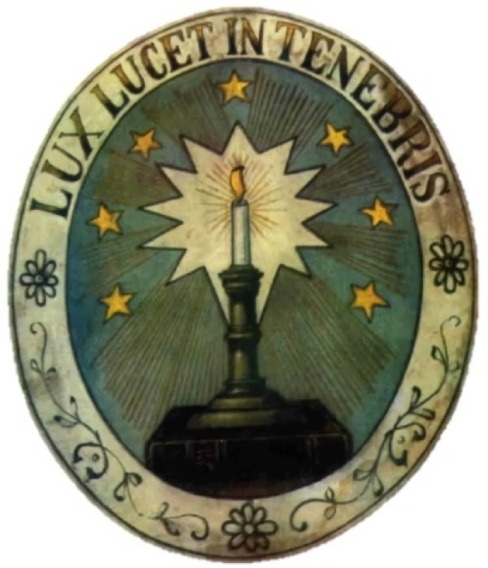A symbol of the Waldensian movement. The motto 'Lux lucet in tenebris' translates to English as 'A light shines in the darkness.'