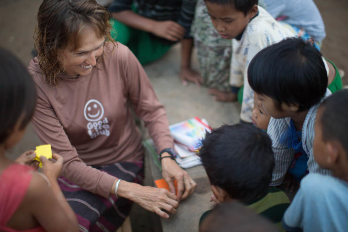 Karen Eubank with children, footage from the film, 'Free Burma Ranger,' 2020