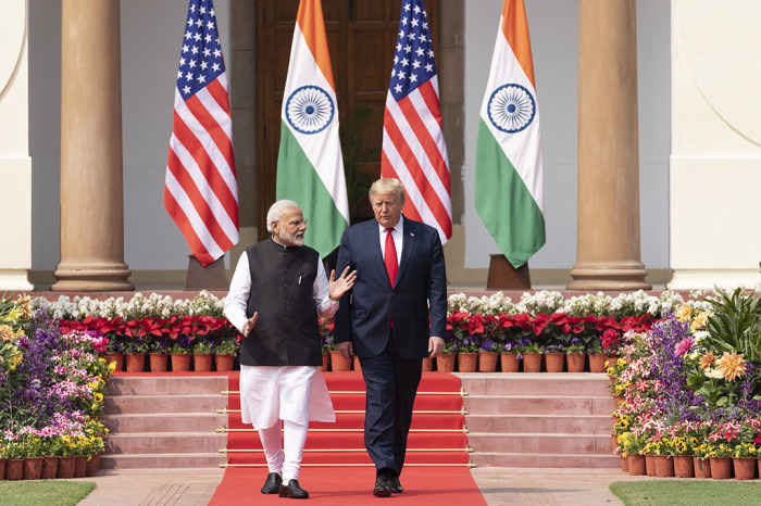 President Donald J. Trump and Indian Prime Minister Narendra Modi walk together from Hyderabad House to deliver a joint press statement Tuesday, Feb. 25, 2020, on the lawn of Hyderabad House in New Delhi. 