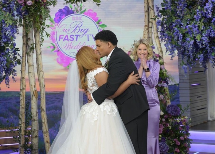 Pastor Joshua and Kiana Powell kiss at their wedding held on Good Morning America’s third-hour show “Strahan, Sara & Keke” on Friday February 28, 2020.