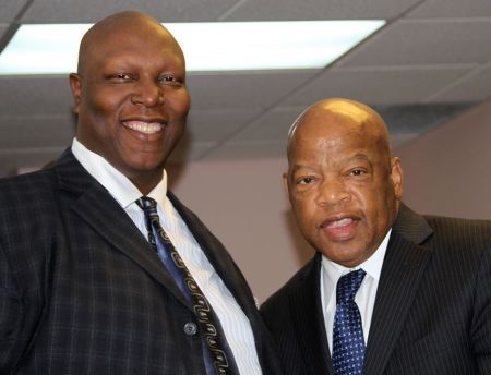 Pastor Terrance "Big T" Hughes and Democratic Congressman John Lewis from Georgia.