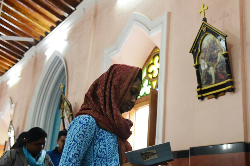 Indian Catholic devotees offer the way of the cross prayers after an Ash Wednesday service at Saint Mary's Basilica in Secunderabad, the twin city of Hyderabad, on March 5, 2014.