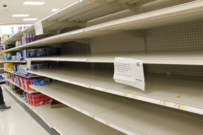 Empty shelves in a Target store in Manhattan, NY, where disinfectant wipes used to be.