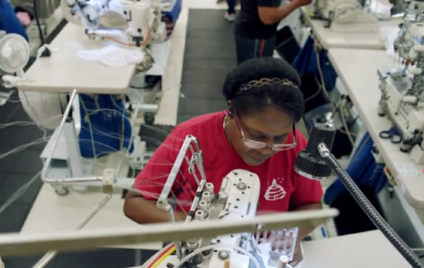 A worker at a Beehive Clothing facility operated by the Church of Jesus Christ of Latter-day Saints.