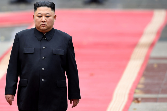 North Korea's leader Kim Jong Un attends a welcoming ceremony and review an honor guard at the Presidential Palace in Hanoi on March 1, 2019. 