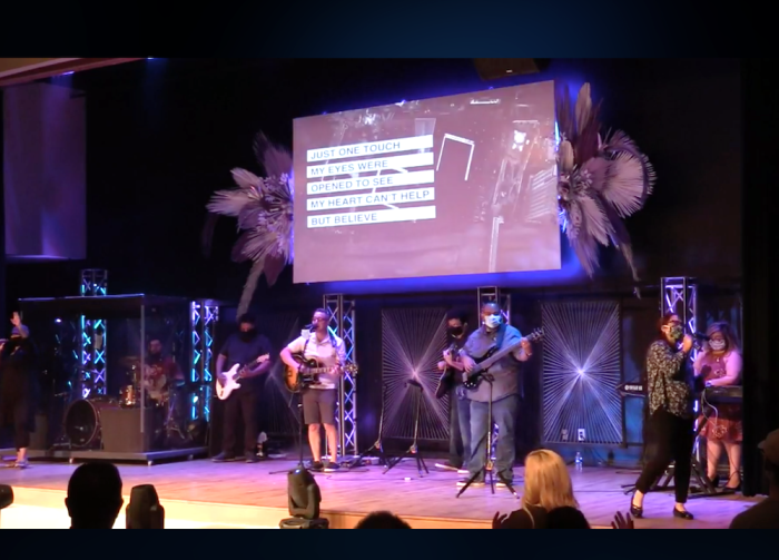 The worship team leads the congregation in singing at Champion Church in Yuma, Arizona, May 3, 2020.
