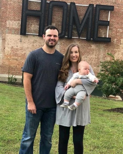 Tampa Bay Rays prospect Blake Bivens poses for a photo with his now deceased wife, Emily, and son, Cullen. 
