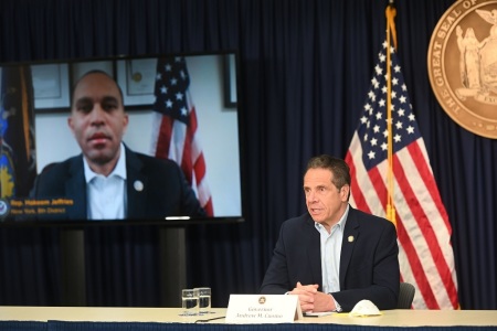 New York Gov. Andrew M. Cuomo talks to U.S. Congressman Hakeem Jeffries via Zoom during his daily coronavirus briefing at his New York City office on Saturday, May 9, 2020.