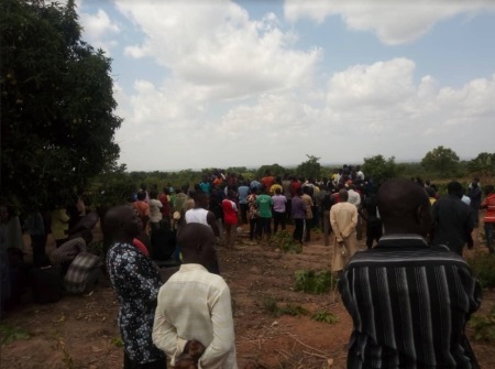 Residents attend a mass burial for 17 people killed in an overnight attack on the Gonan Rogo village of Nigeria's Kaduna state on May 12, 2020.