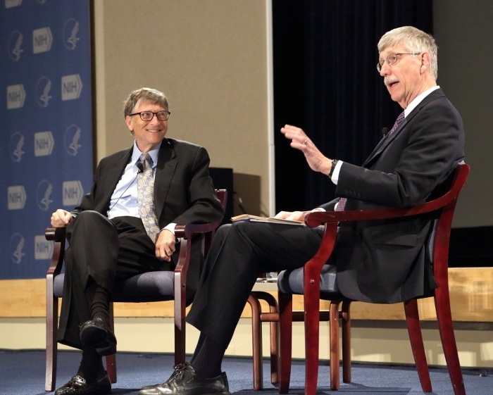 Bill Gates (L) and NIH director Dr. Francis Collins (R) engage in a discussion on the Masur Auditorium stage during the second half of the annual David E. Barmes Global Health Lecture at the National Institutes of Health, December 2, 2014.