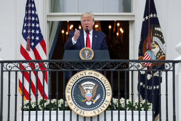 U.S. President Donald Trump speaks from the Truman Balcony during a Rolling to Remember Ceremony: Honoring Our Nation’s Veterans and POW/MIA at the White House May 22, 2020, in Washington, DC. President Trump hosted the event to honor America’s veterans and fallen heroes. 
