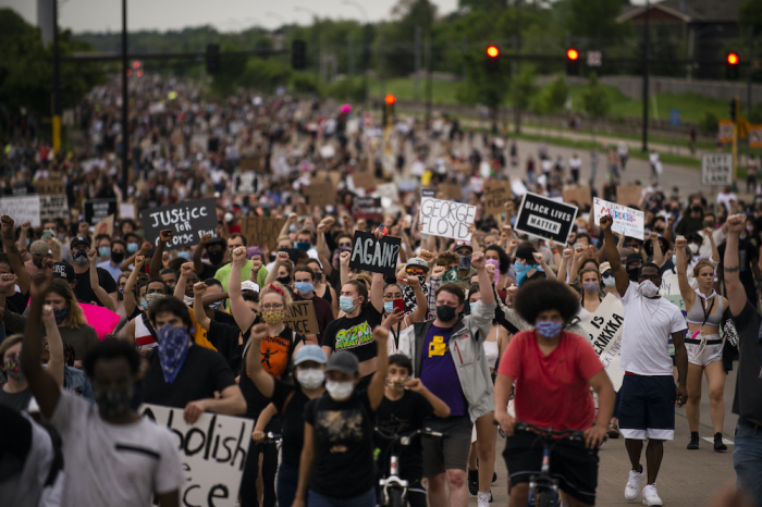 Protesters march on Hiawatha Avenue while decrying the killing of George Floyd on May 26, 2020 in Minneapolis, Minnesota. 