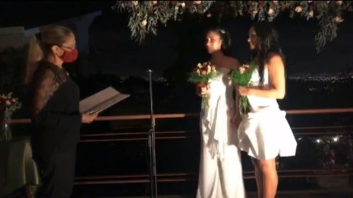 Daritza Araya Arguedas and Alexandra Quirós Castillo participate in their wedding ceremony in San Isidro de Heredia on May 26, 2020. 