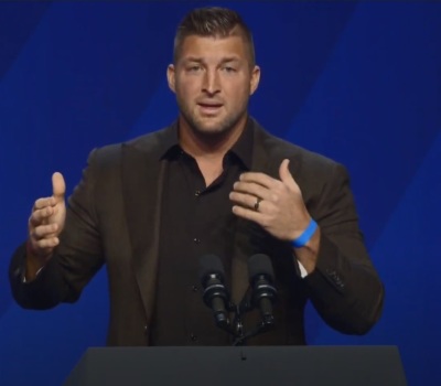 Former National Football League player Tim Tebow gives remarks at a memorial service for Ravi Zacharias at Passion City Church of Atlanta, Georgia, on May 29, 2020. 