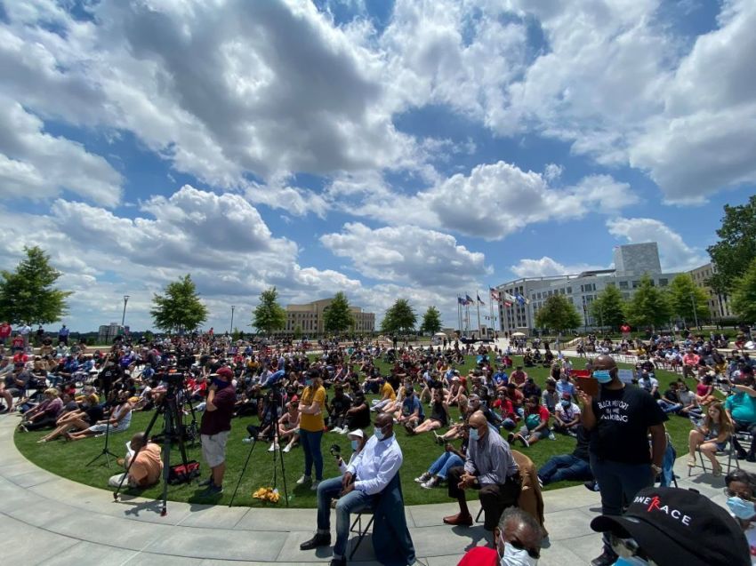 Attendees watch on as pastors and leaders speak during a press conference organized by the OneRace Movement to announce the "The OneRace Statement on Righteousness and Justice: A call to end Racial Violence." The event was held on June 1, 2020 at Liberty Plaza in Atlanta, Georgia.