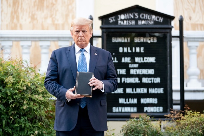 President Donald Trump holds a Bible while visiting St. John's Church across from the White House in Washington, D.C. after the area was cleared of people protesting the death of George Floyd June 1, 2020. 