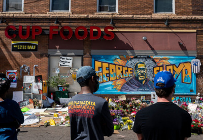A group of people gathers at a memorial for George Floyd on June 3, 2020 in Minneapolis, Minnesota. 