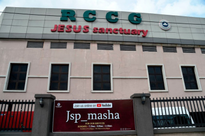 A sign directing worshippers to stream the Easter service online is seen at the Redeemed Christian Church of God (RCCG), in Lagos, on April 12, 2020. 