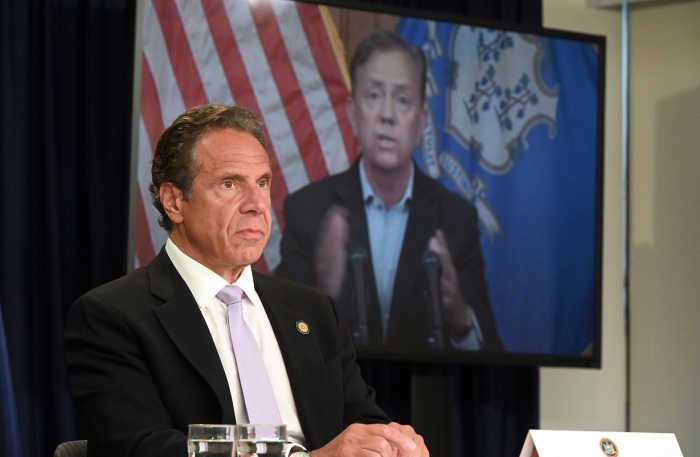 New York Governor Andrew M. Cuomo (pictured), New Jersey Governor Phil Murphy and Connecticut Governor Ned Lamont (screen) yon June 24, 2020.
