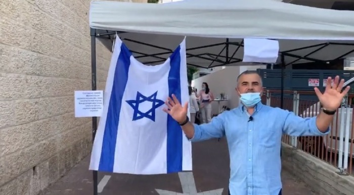 Pastor Israel Pochtar stands outside of Congregation Beit Hallel in Ashdod, Israel. 