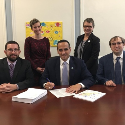 Somerville Mayor Joe Curtatone (C) with members of his city's Office of Strategic Planning and Community Development in Mass.