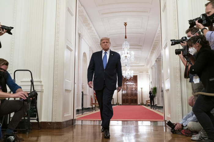 President Donald J. Trump walks into the East Room of the White House to talk about Operation Legend: Combatting Violent Crime in American Cities Wednesday, July 22, 2020, at the White House.