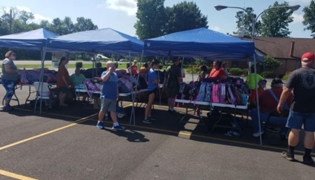 Whiteash Free Will Baptist Church of Marion, Illinois, gives away around 500 backpacks full of school supplies on July 25, 2020.