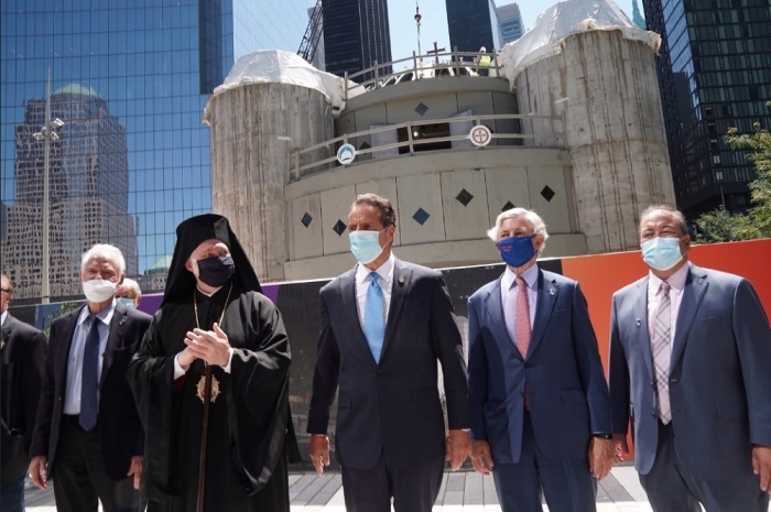 New York Gov. Andrew Cuomo (middle-right) and Archbishop Elpidophoros of America (middle-left) pose with others at the construction site of St. Nicholas Greek Orthodox Church and National Shrine of New York City on Monday, Aug. 3, 2020. 