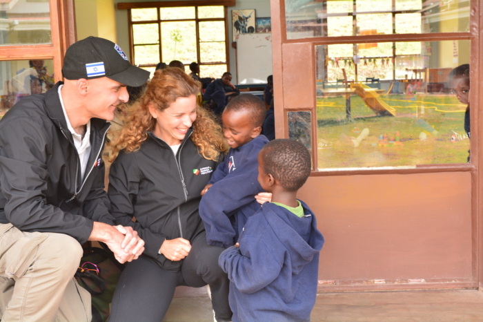 Mark and Erica Gerson talk with children at The Plaster House in Tanzania in September 2018. 