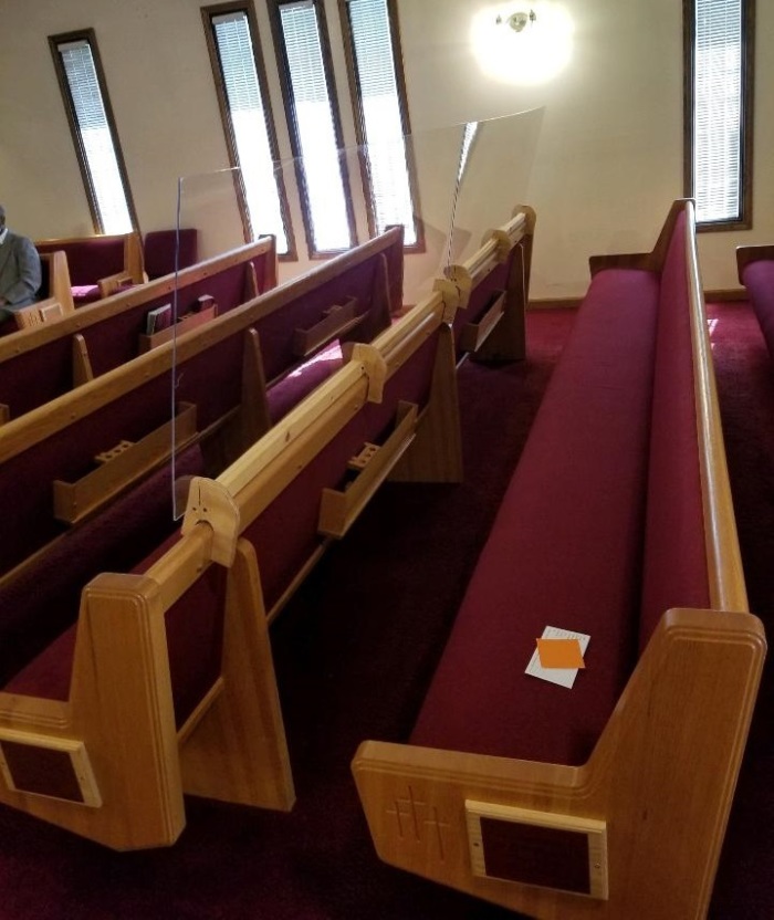 Progressive Church of God in Christ of Springfield, Illinois installed Plexiglas barriers in their pews in August 2020 to help curb the spread of COVID-19. 