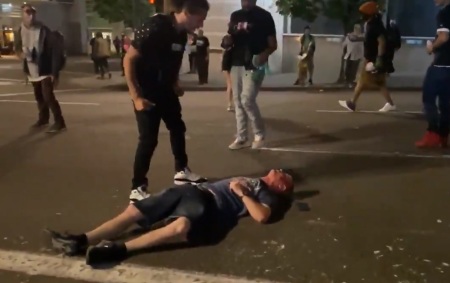 A man lays unconscious on a street in Portland, Oregon after being kicked in the head by a protester on Aug. 16, 2020. 